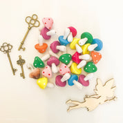 Large wooden mushrooms, ideal for fairy gardens, whimsical decor, or Christmas elf setups.