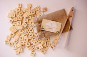 100 Lowercase Tiles: Wooden lowercase letter tiles for learning and activities.
