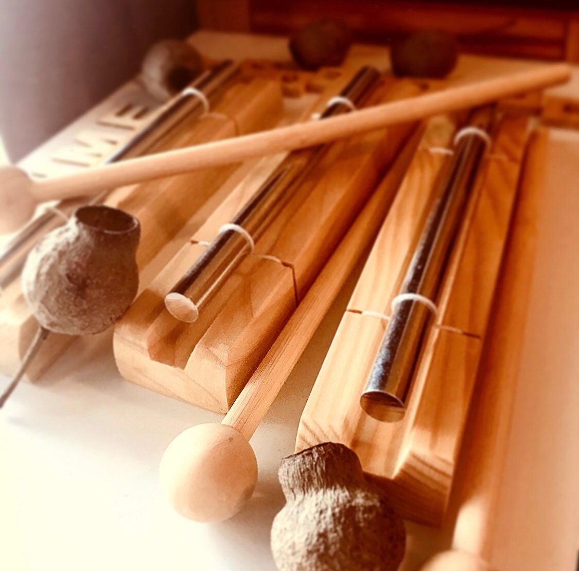 Percussion chime and drumstick, a fun musical instrument for all ages.