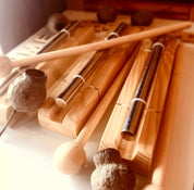 Percussion chime and drumstick, a fun musical instrument for all ages.