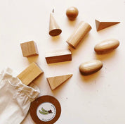 Set of 10 geometric wooden 3D solids, ideal for teaching shapes, math, or STEM learning.