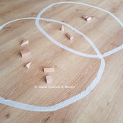 Set of 10 geometric wooden 3D solids, ideal for teaching shapes, math, or STEM learning.