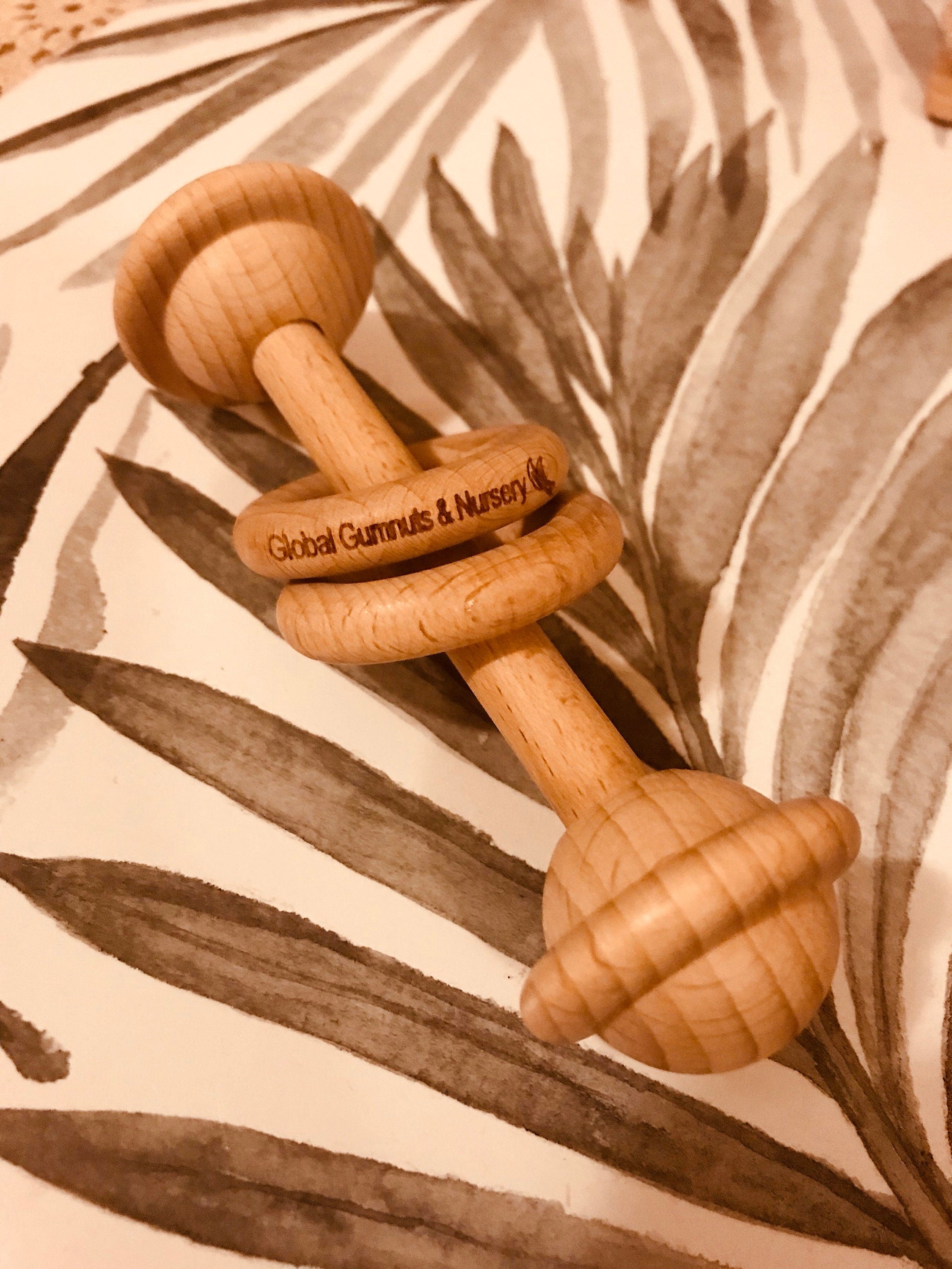 Natural baby rattle, a beautifully crafted, eco-friendly toy for little ones.