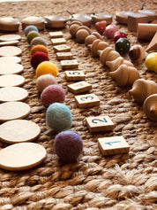 1-10 Wooden Number Tiles: Wooden tiles for number recognition and counting practice.