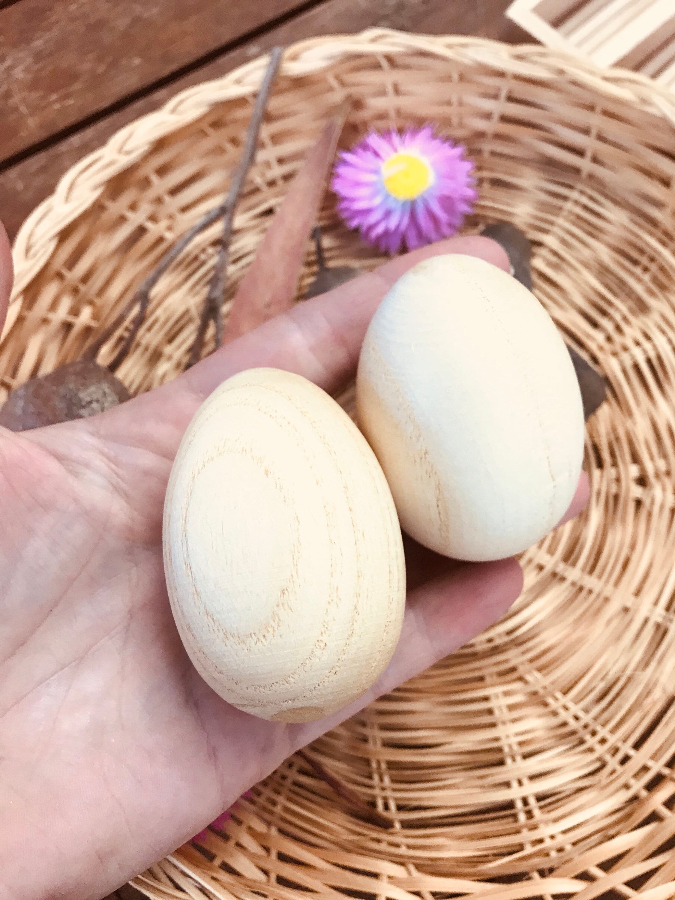 Wooden egg shakers, available individually or as a set of 2, perfect for Easter or musical fun.