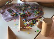 Set of 10 geometric wooden 3D solids, ideal for teaching shapes, math, or STEM learning.