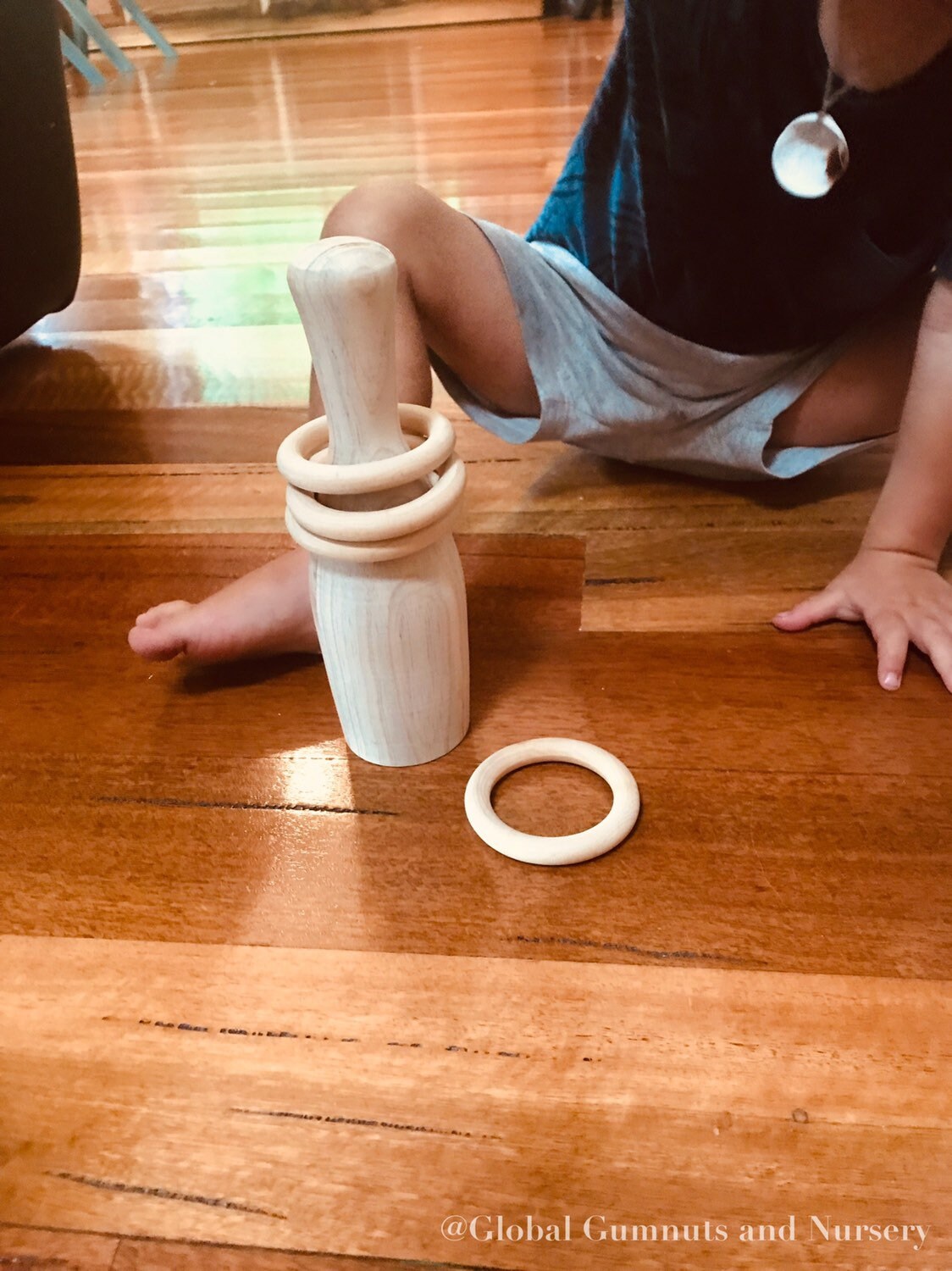 Natural Wooden Bowling Pin Set: Handmade in Western Australia, ideal for ring toss games.