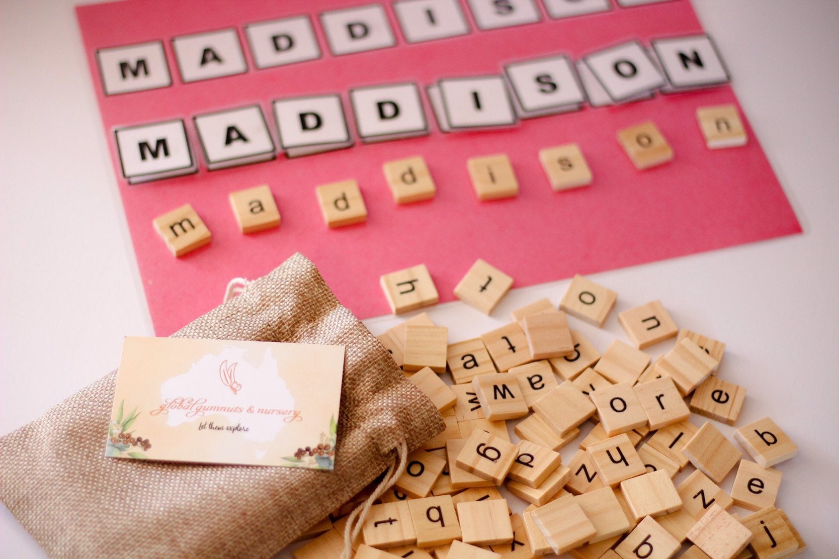 100 Lowercase Tiles: Wooden lowercase letter tiles for learning and activities.
