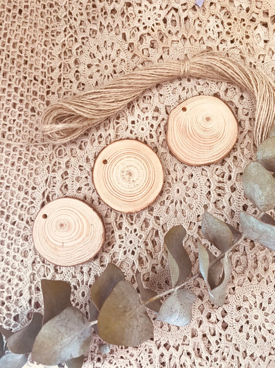 Wood Slices with Drilled Hole: Natural wood slices with pre-drilled holes, great for crafts, ornaments, or rustic wedding decorations.
