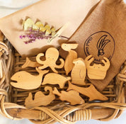 wooden ocean sea animals set: ocean-themed wooden animals, including fish and sharks.