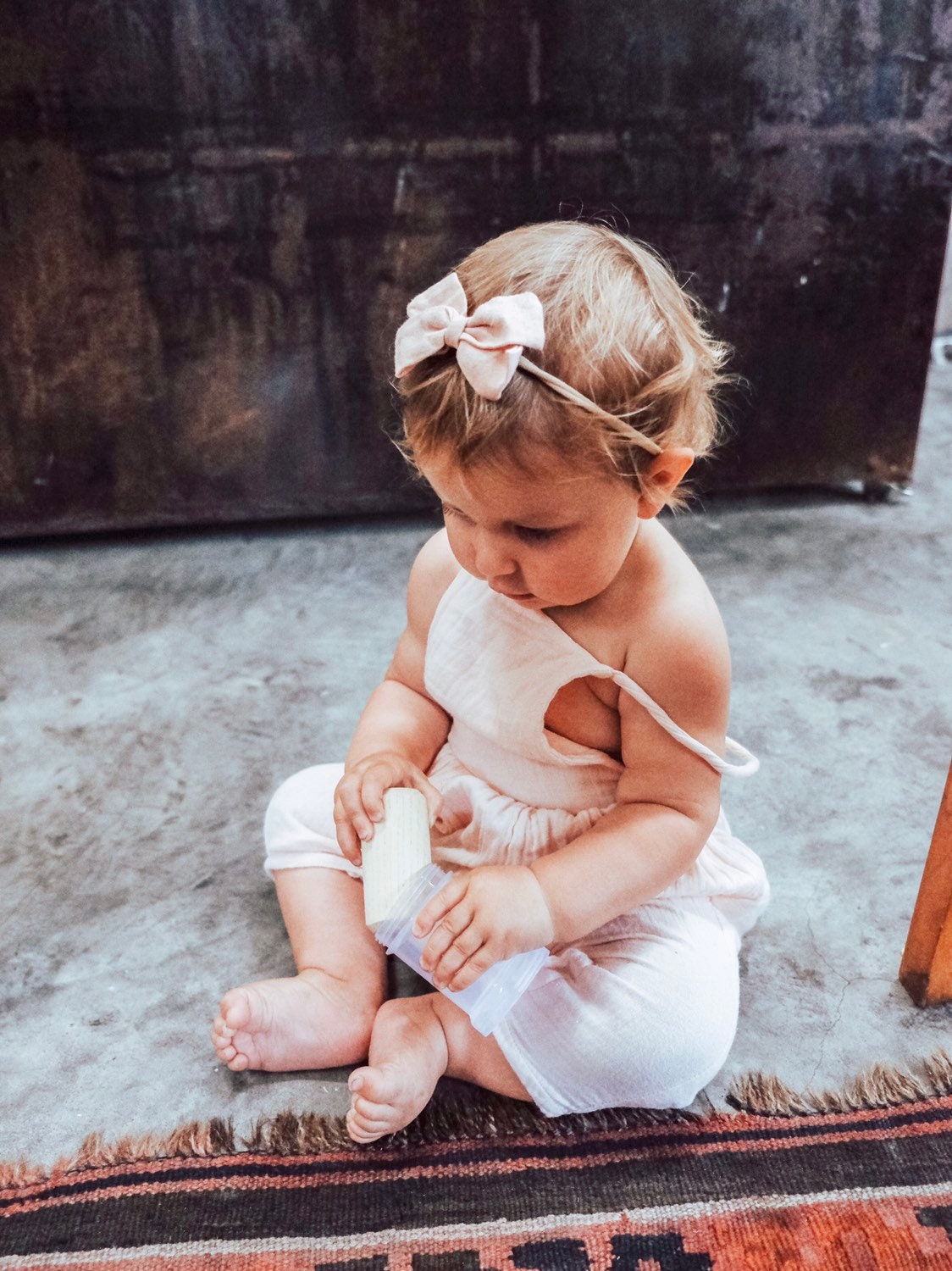 Natural cylindrical shaker, a single piece for rhythmic play or musical exploration.