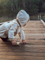 Natural cylindrical shaker, a single piece for rhythmic play or musical exploration.