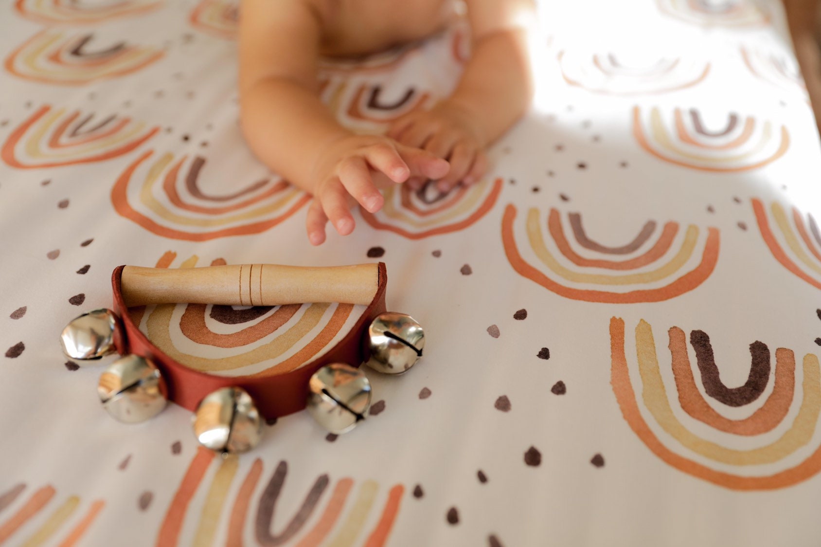 Half-moon tambourine, a delightful kids' musical instrument for rhythm fun and creativity.