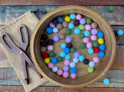 Wooden Scissor Tongs: Play tongs for motor skill development and pretend kitchen play.
