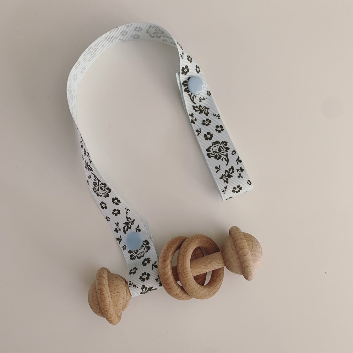 Natural baby rattle, a beautifully crafted, eco-friendly toy for little ones.