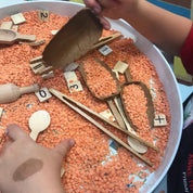 wooden baby tongs: early learning tongs for developing fine motor skills.