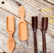 Long-handled wooden scoop, a versatile spoon perfect for natural play or kitchen use.