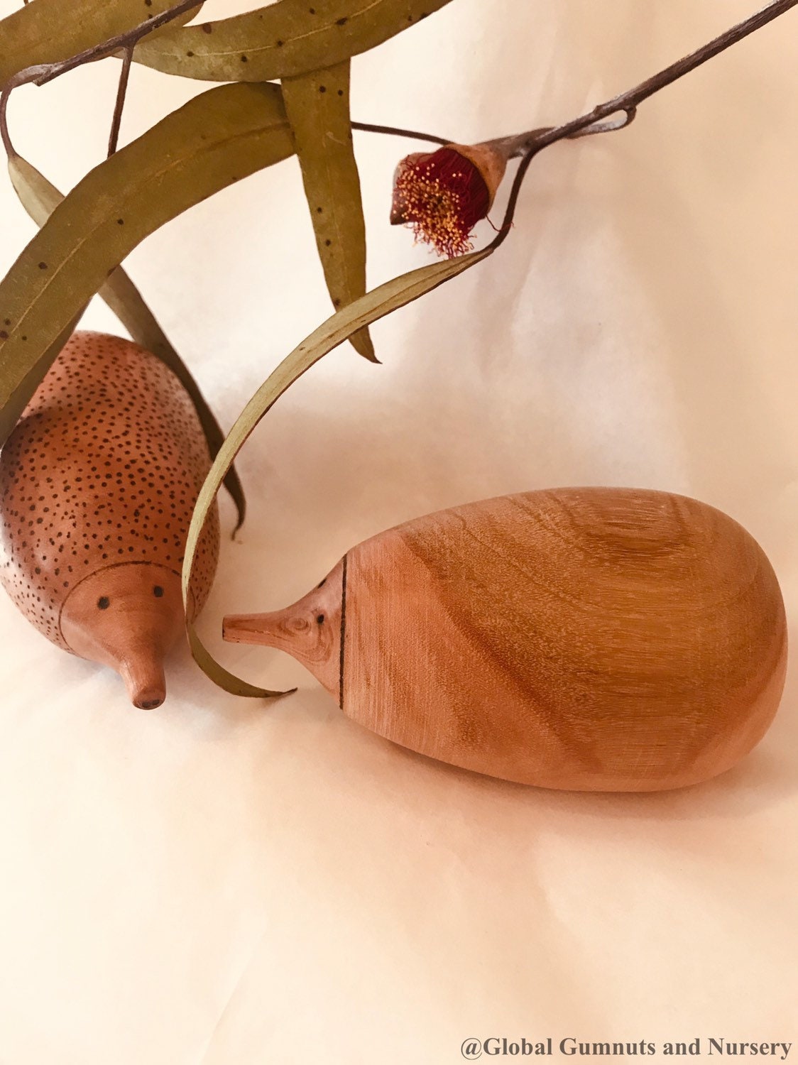 Handmade Wooden Echidna: Natural wooden echidna figure for decoration or play.