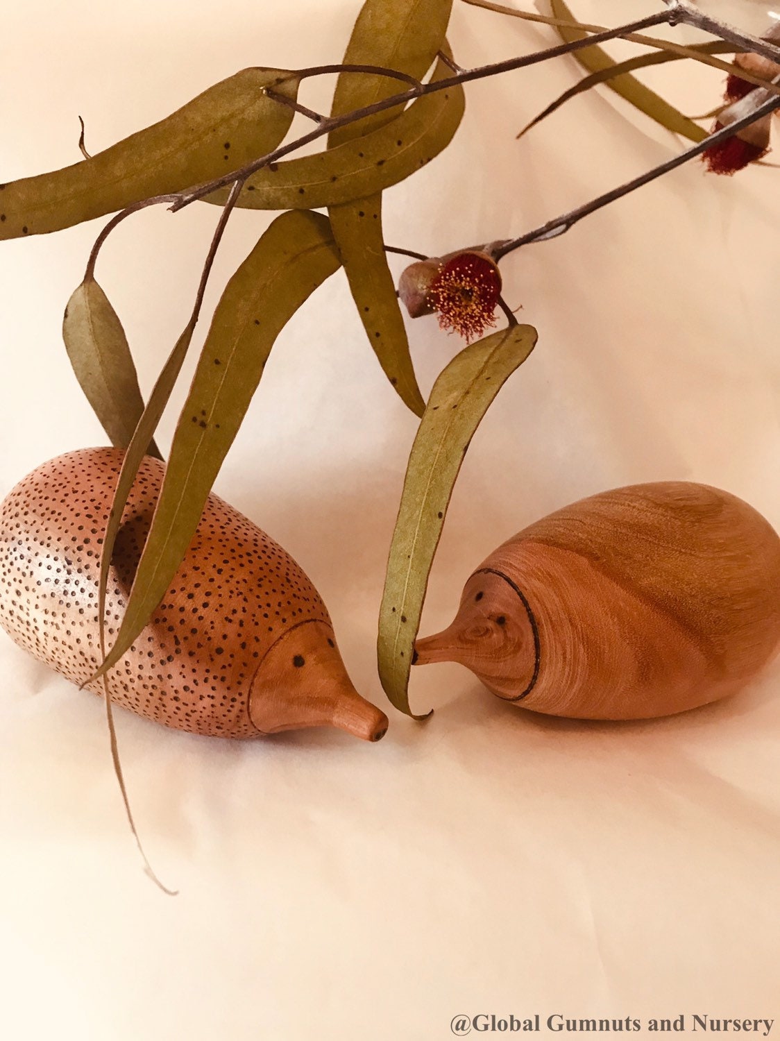 Handmade Wooden Echidna: Natural wooden echidna figure for decoration or play.