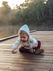 Natural cylindrical shaker, a single piece for rhythmic play or musical exploration.