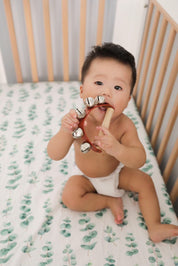 Half-moon tambourine, a delightful kids' musical instrument for rhythm fun and creativity.