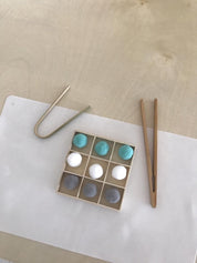 wooden baby tongs: early learning tongs for developing fine motor skills.