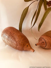 handmade wooden echidna: natural wooden echidna figure for decoration or play.