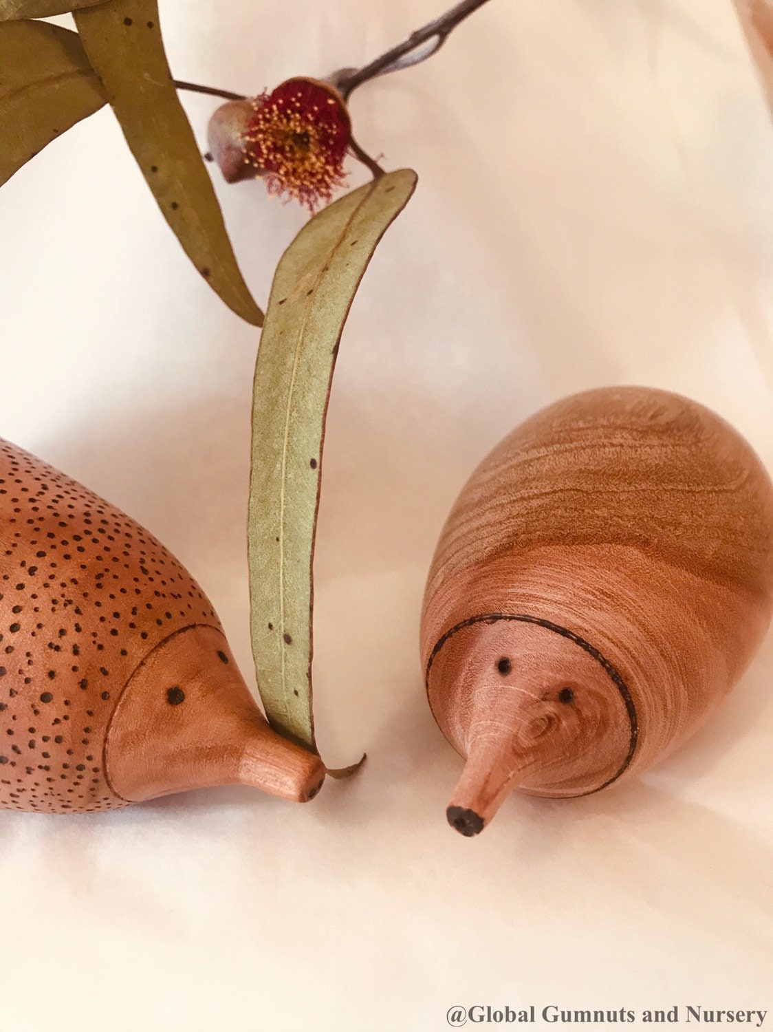 Handmade Wooden Echidna: Natural wooden echidna figure for decoration or play.