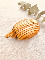 Handmade Wooden Echidna: Natural wooden echidna figure for decoration or play.