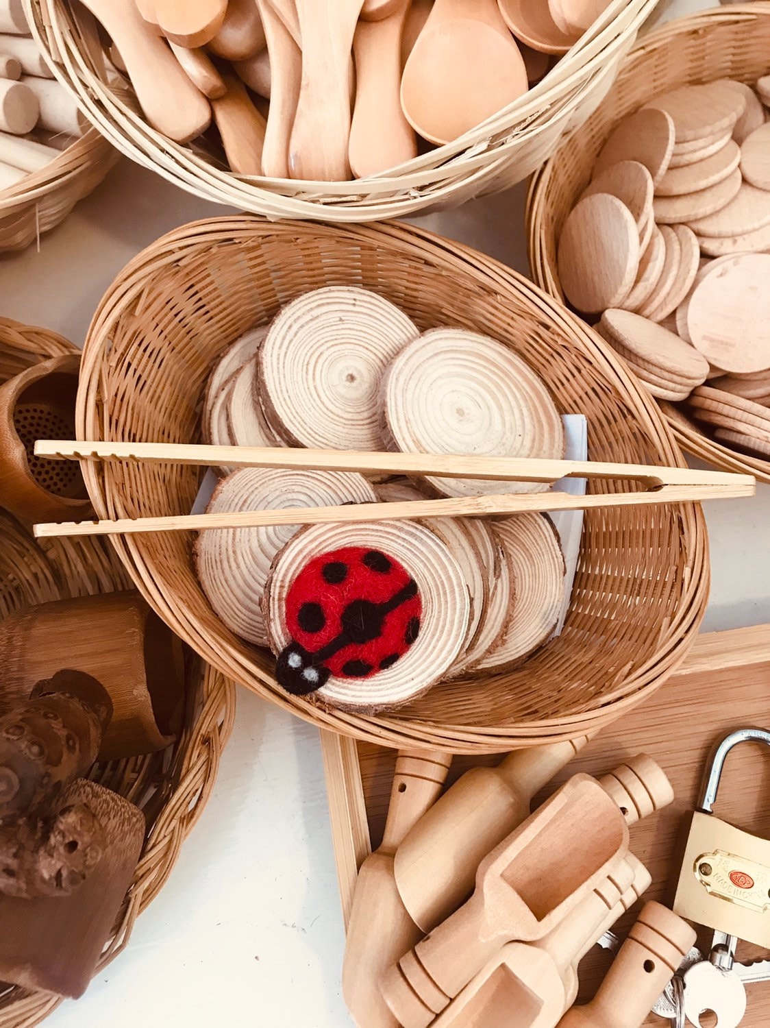 wooden baby tongs: early learning tongs for developing fine motor skills.