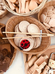 wooden baby tongs: early learning tongs for developing fine motor skills.