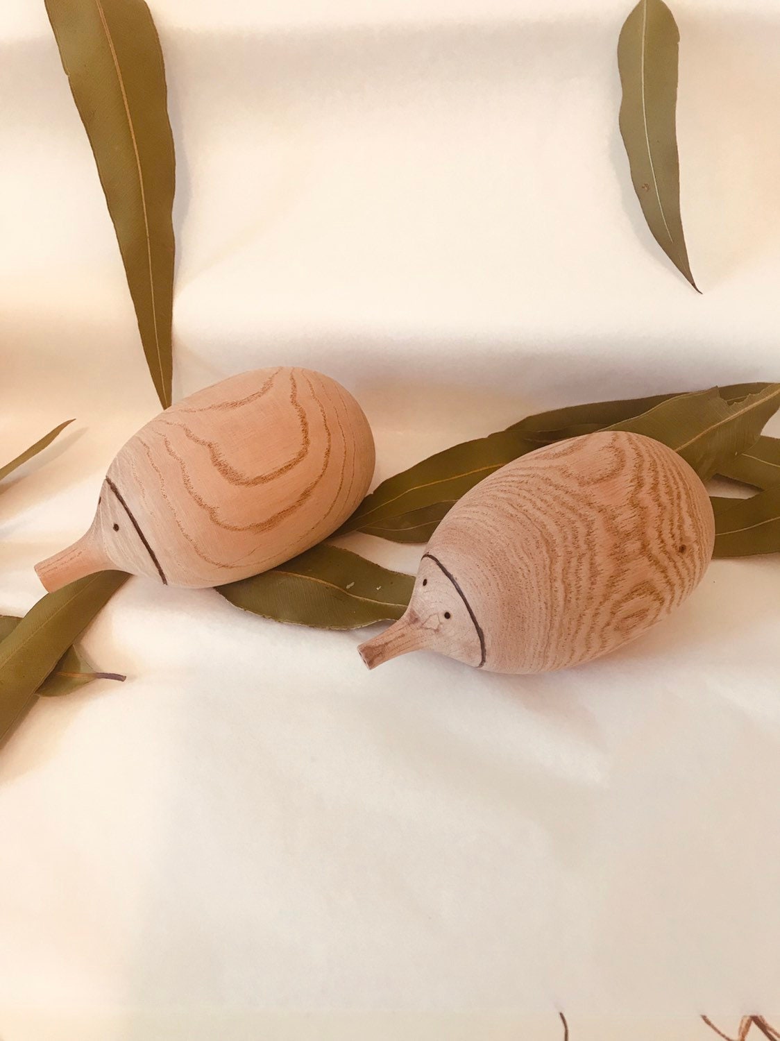 Handmade Wooden Echidna: Natural wooden echidna figure for decoration or play.