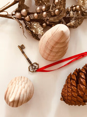 kids wooden view finder: nature exploration tool for observing clouds and leaves.