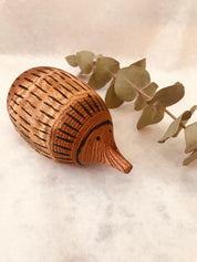 Handmade Wooden Echidna: Natural wooden echidna figure for decoration or play.