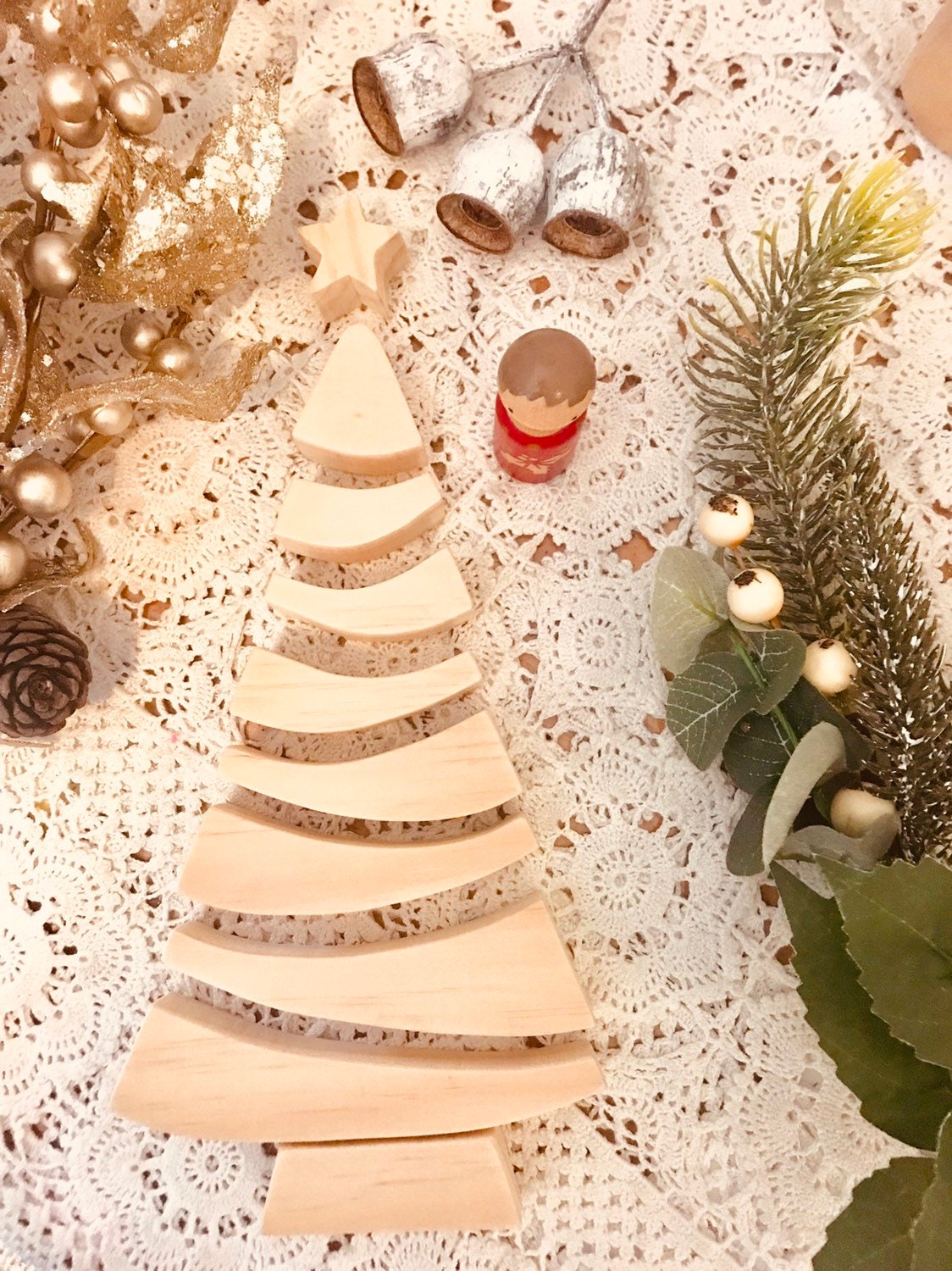 Large 9-Piece Christmas Tree Puzzle: 31cm wooden stacker tree puzzle for seasonal play and decor.