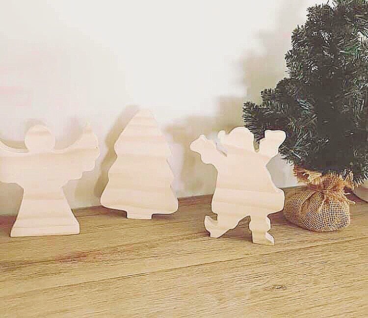 Handmade Wooden Angel: Wooden angel with movable wings, ideal for decor or gifts.