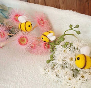 Adorable felt bees, perfect for kids' playtime, imaginative crafts, or buzzing into charming decor projects.