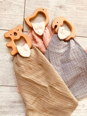 Meet your spiky sidekick: a cozy echidna plush with a blanket for snuggly moments.