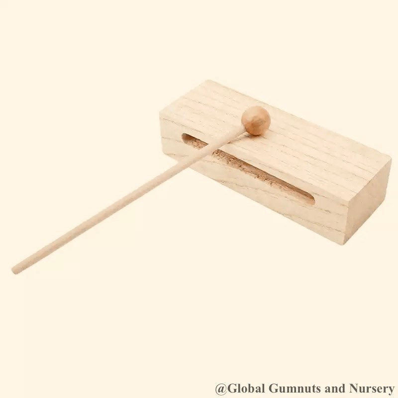 Michael's percussion block, a classic musical instrument for rhythmic fun.