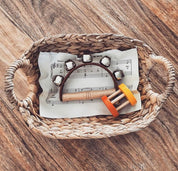 Half-moon tambourine, a delightful kids' musical instrument for rhythm fun and creativity.