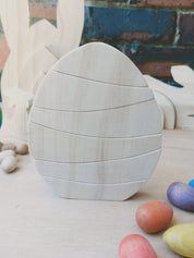 Rainbow Egg Wooden Stacker: Colourful egg-shaped stacker toy.