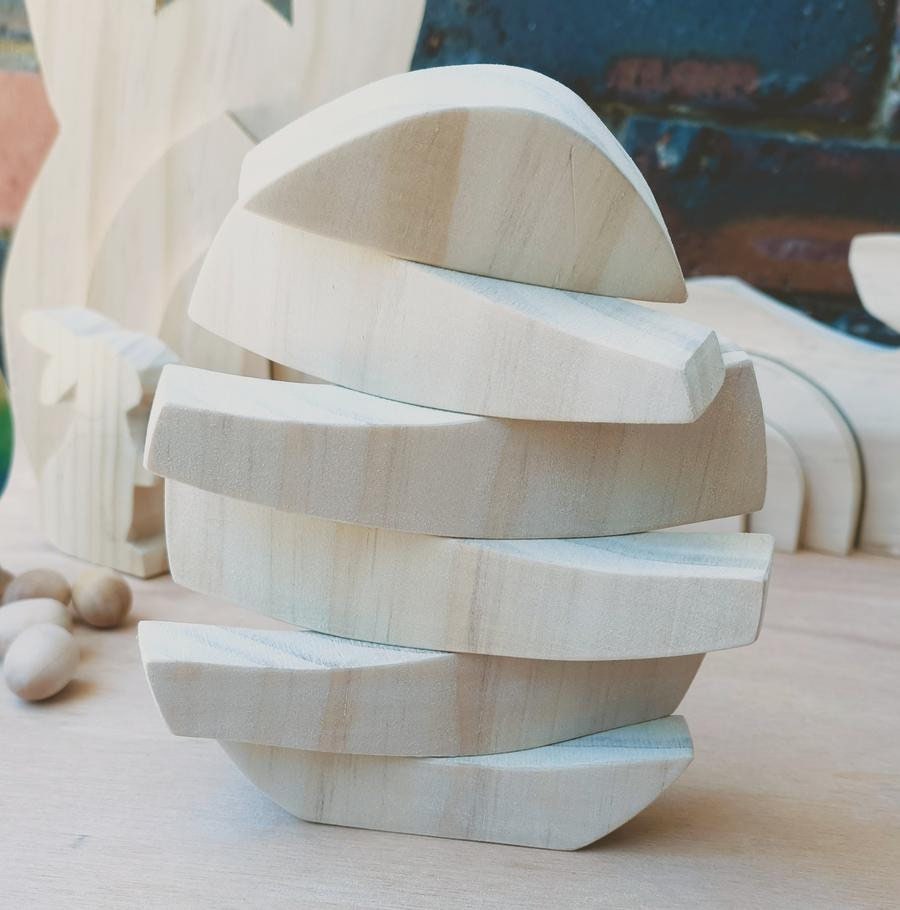 Rainbow Egg Wooden Stacker: Colourful egg-shaped stacker toy.