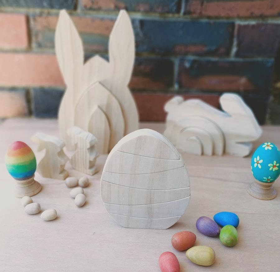 Rainbow Egg Wooden Stacker: Colourful egg-shaped stacker toy.