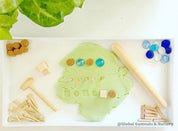 Rounded Wooden Rolling Pin: Rounded-end rolling pin for sensory play and crafts.