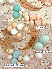 Australian Gumnut Arched Mobile: Delicate gumnut mobile for nursery decor.
