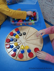 Wooden sorting board with 12 colorful sections for educational activities like counting, color sorting, and clock learning.