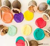 Fruit Salad Stamp Collection: Eight-piece gumnut stamp set with fruit designs.
