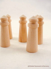 Mini wooden lighthouse, a charming addition to beach-themed decor or playtime.