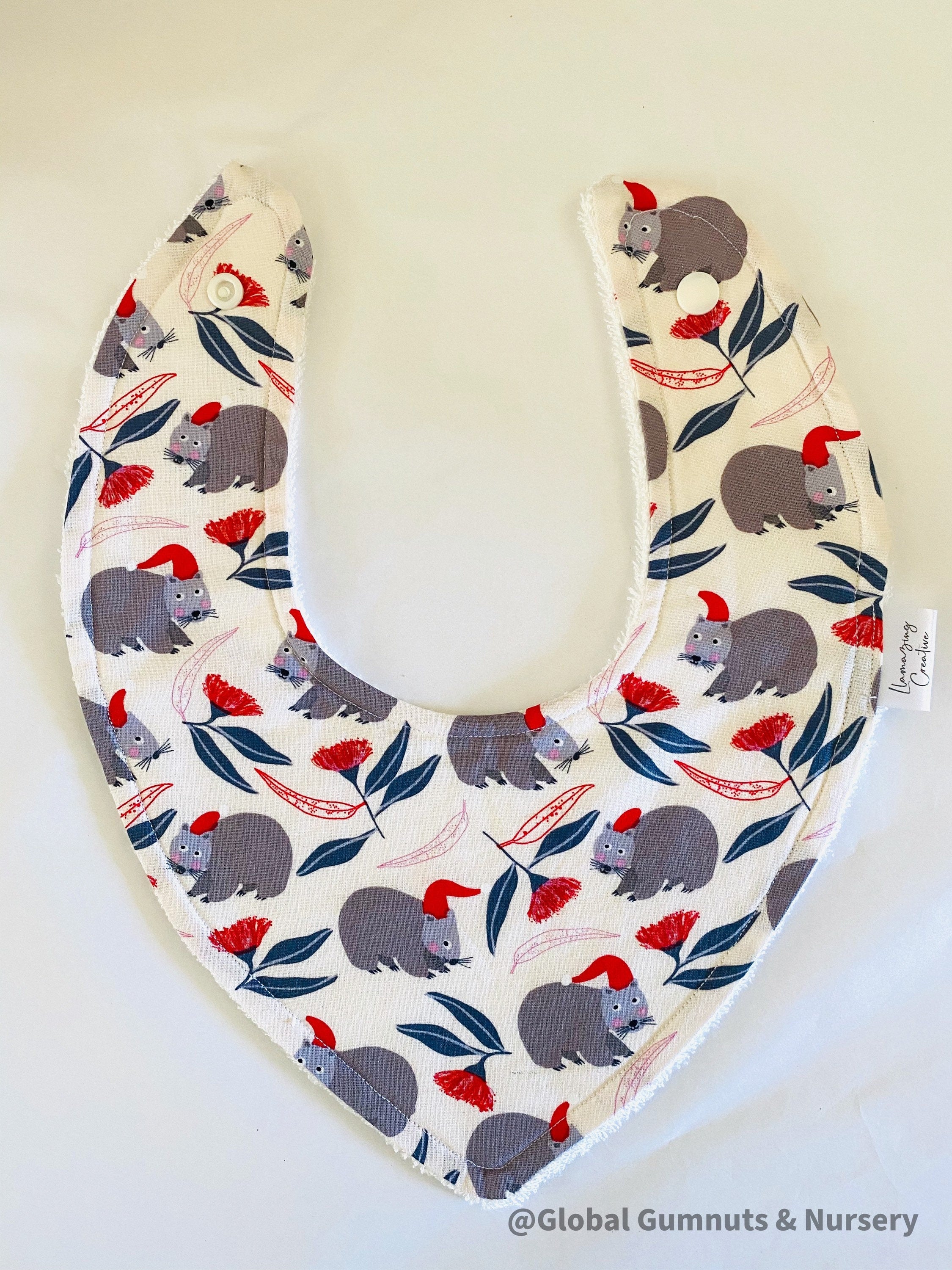 Christmas WOMBAT Bib: Baby bib with a festive wombat design.