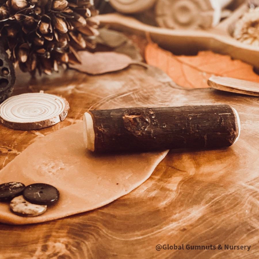 Rolling Pin Tree Branch: Natural wooden rolling pin ideal for play dough and sensory activities.